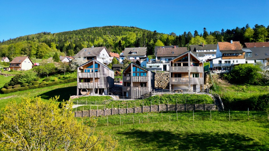 Deckhouses on the hillside with mountain views